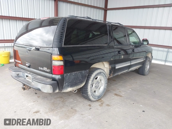 2004 Chevrolet Suburban LT with VIN 1GNEC16Z44J332278, listed as a IAAI auction lot 41902358 with 372,990 mi miles. Bid and sale history available at carsss.com. Image 4.