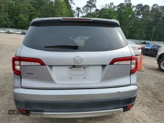 2021 Honda Pilot EX-L with VIN 5FNYF5H54MB018989, listed as a Copart auction lot 55721405 with 121,359 mi miles and Salvage Title. Bid and sale history available at carsss.com. Image 6.