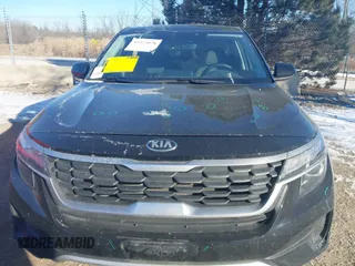 2021 Kia Seltos LX with VIN KNDEPCAA1M7229729, listed as a IAAI auction lot 41322078 with 49,297 mi miles. Bid and sale history available at carsss.com. Image 12.