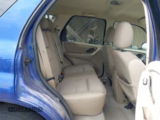2005 Ford Escape XLT with VIN 1FMYU93195KA35708, listed as a IAAI auction lot 42130239 with 230,920 mi miles. Bid and sale history available at carsss.com. Image 8.