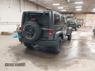 2018 Jeep Wrangler JK Unlimited Sport S with VIN 1C4BJWDGXJL889020, listed as a IAAI auction lot 41989203 with 60,170 mi miles. Bid and sale history available at carsss.com. Image 4.