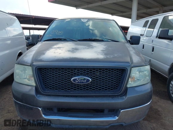 2004 Ford F-150 XLT with VIN 1FTRW12W14KD43052, listed as a IAAI auction lot 41439615 with 241,554 mi miles. Bid and sale history available at carsss.com. Image 6.
