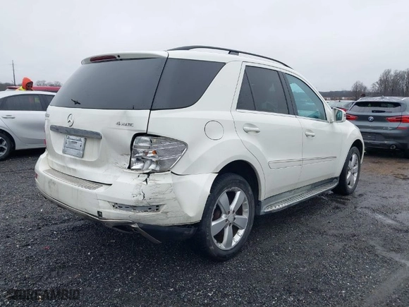 2011 Mercedes-Benz M-Class ML 350 with VIN 4JGBB8GB4BA683886, listed as a IAAI auction lot 41557555 with 157,418 mi miles. Bid and sale history available at carsss.com. Image 4.