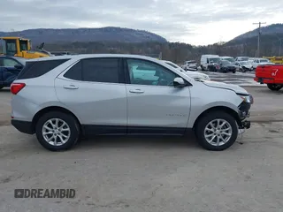 2018 Chevrolet Equinox LT z VIN 2GNAXSEV9J6212976, wystawiony jako IAAI lot #41643246 z przebiegiem 120 814 mil mil oraz . Historia ofert i sprzedaży dostępna na DreamBid. Obrazek 13.
