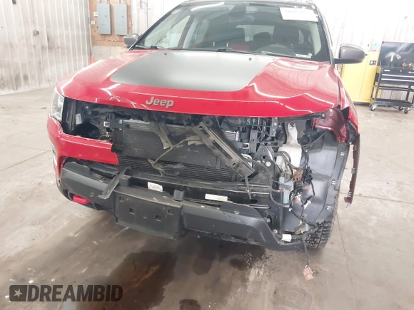 2018 Jeep Compass Trailhawk with VIN 3C4NJDDB7JT234551, listed as a IAAI auction lot 41695627 with 65,381 mi miles and . Bid and sale history available at carsss.com. Image 6.