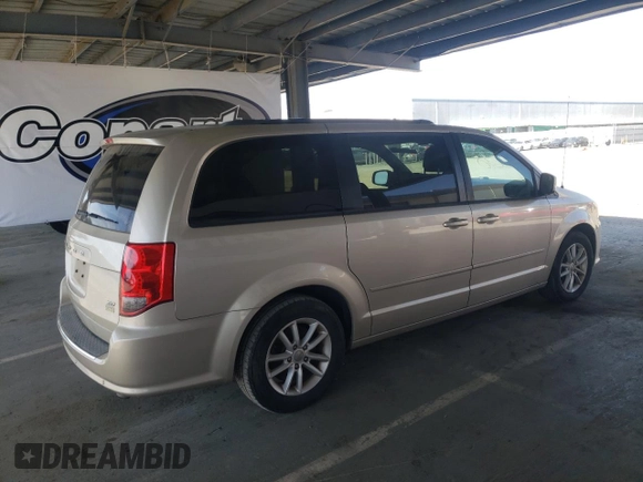 2014 Dodge Grand Caravan SXT with VIN 2C4RDGCG6ER427418, listed as a Copart auction lot 55841215 with 154,524 mi miles and Clean Title. Bid and sale history available at DreamBid. Image 3.