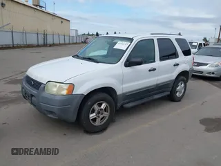 2004 Ford Escape XLS with VIN 1FMYU02104KB25647, listed as a IAAI auction lot 41916737 with 199,361 mi miles and . Bid and sale history available at DreamBid. Image 2.