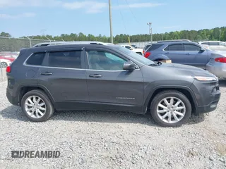 2015 Jeep Cherokee Limited with VIN 1C4PJLDS9FW516548, listed as a IAAI auction lot 42108725 with 122,190 mi miles and . Bid and sale history available at DreamBid. Image 13.