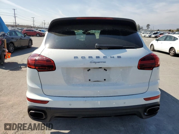 2016 Porsche Cayenne with VIN WP1AA2A20GLA00567, listed as a Copart auction lot 55452685 with Not provided miles and Salvage title. Bid and sale history available at DreamBid. Image 6.