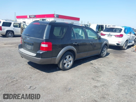 2005 Ford Freestyle SE with VIN 1FMZK01165GA48072, listed as a IAAI auction lot 41782025 with 235,073 mi miles. Bid and sale history available at carsss.com. Image 4.