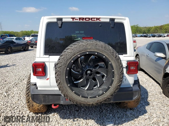 2021 Jeep Wrangler Unlimited Rubicon with VIN 1C4HJXFN3MW634045, listed as a Copart auction lot 52684805 with 34,133 mi miles and Clean Title. Bid and sale history available at DreamBid. Image 6.