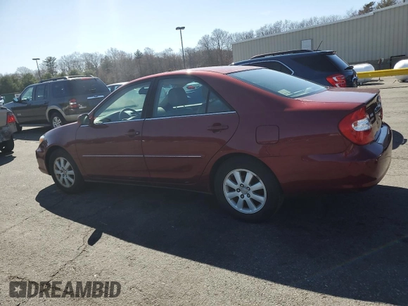 2004 Toyota Camry LE with VIN 4T1BE30KX4U297754, listed as a Copart auction lot 50795425 with 184,152 mi miles and Salvage Title. Bid and sale history available at DreamBid. Image 2.