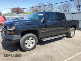 2018 Chevrolet Silverado 1500 LT with VIN 3GCUKREC2JG645250, listed as a Copart auction lot 53312255 with 209,080 mi miles and Salvage Title. Bid and sale history available at DreamBid. Image 1.
