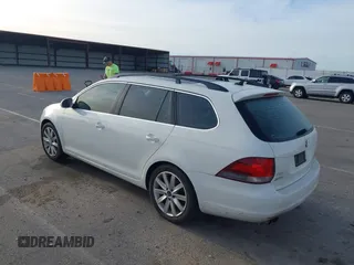 2011 Volkswagen Jetta SportWagen TDI with VIN 3VWPL7AJ7BM702061, listed as a IAAI auction lot 42088506 with 243,200 mi miles. Bid and sale history available at carsss.com. Image 3.