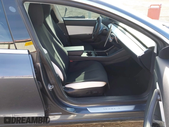 2020 Tesla Model 3 Long Range with VIN 5YJ3E1EB3LF801834, listed as a IAAI auction lot 42015079 with 47,793 mi miles. Bid and sale history available at carsss.com. Image 5.
