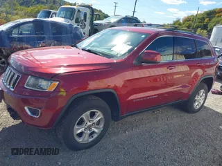 2014 Jeep Grand Cherokee Laredo with VIN 1C4RJFAG8EC262292, listed as a IAAI auction lot 40568162 with 124,871 mi miles and . Bid and sale history available at DreamBid. Image 2.