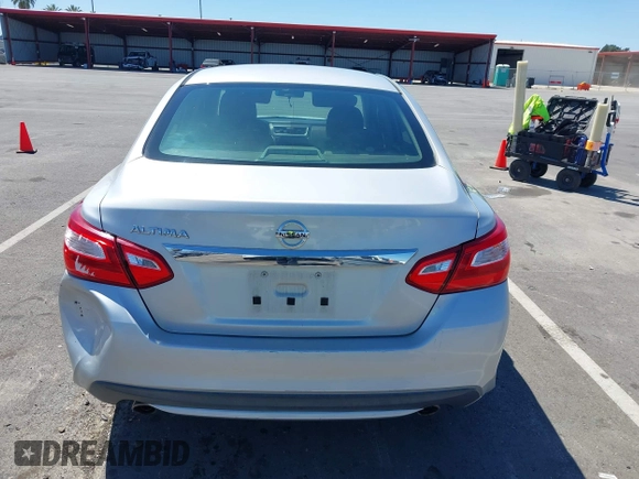 2016 Nissan Altima S z VIN 1N4AL3AP2GN316463, wystawiony jako IAAI lot #42339307 z przebiegiem 101 857 mil mil oraz . Historia ofert i sprzedaży dostępna na DreamBid. Obrazek 16.