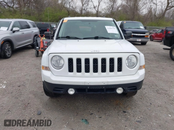 2014 Jeep Patriot Sport with VIN 1C4NJRBB1ED744101, listed as a IAAI auction lot 42009390 with 180,214 mi miles. Bid and sale history available at carsss.com. Image 13.
