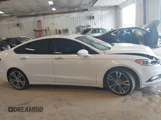 2017 Ford Fusion Titanium with VIN 3FA6P0D9XHR136815, listed as a IAAI auction lot 42596651 with 109,608 mi miles and . Bid and sale history available at DreamBid. Image 13.