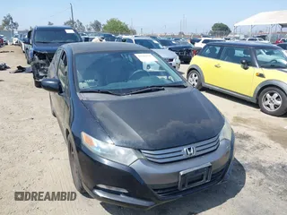 2010 Honda Insight LX with VIN JHMZE2H50AS014165, listed as a IAAI auction lot 42381535 with 169,032 mi miles and . Bid and sale history available at DreamBid. Image 1.