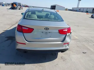 2015 Kia Optima LX with VIN 5XXGM4A78FG477630, listed as a IAAI auction lot 41771874 with 107,065 mi miles and . Bid and sale history available at DreamBid. Image 6.
