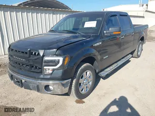 2013 Ford F-150 XL with VIN 1FTFW1CT5DKF20404, listed as a IAAI auction lot 41153325 with 148,608 mi miles. Bid and sale history available at carsss.com. Image 17.