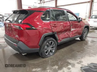 2023 Toyota RAV4 Hybrid XLE Premium with VIN JTMB6RFV4PD116495, listed as a IAAI auction lot 42588604 with 24,258 mi miles and . Bid and sale history available at DreamBid. Image 4.