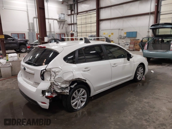 2015 Subaru Impreza Premium with VIN JF1GPAC64FH272292, listed as a IAAI auction lot 42189917 with 125,386 mi miles and . Bid and sale history available at DreamBid. Image 4.