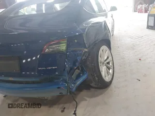 2022 Tesla Model 3 Long Range with VIN 5YJ3E1EB8NF255163, listed as a IAAI auction lot 42105451 with 40,166 mi miles and . Bid and sale history available at DreamBid. Image 19.