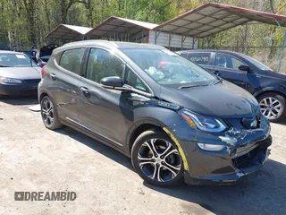 2018 Chevrolet Bolt EV Premier with VIN 1G1FX6S03J4119878, listed as a IAAI auction lot 42051088 with 52,859 mi miles and . Bid and sale history available at DreamBid. Image 1.
