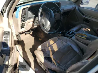 1993 Ford Explorer Eddie Bauer z VIN 1FMDU32X2PUB85958, wystawiony jako Copart lot #78896464 z przebiegiem 61 905 mil mil oraz Szkoda całkowita • Salvage title. Historia ofert i sprzedaży dostępna na DreamBid. Obrazek 8.