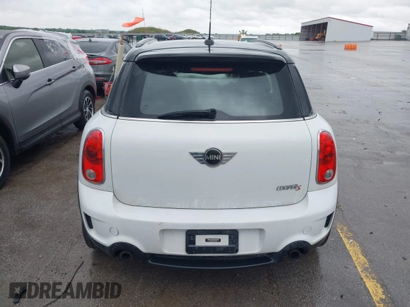 2013 MINI Countryman S ALL4 with VIN WMWZC5C50DWP30199, listed as a IAAI auction lot 42399104 with 103,367 mi miles and . Bid and sale history available at DreamBid. Image 13.