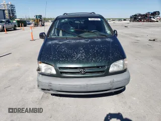 2000 Toyota Sienna LE with VIN 4T3ZF13C2YU193910, listed as a Copart auction lot 56395564 with 228,638 mi miles and Salvage Title. Bid and sale history available at carsss.com. Image 5.