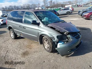 2003 Dodge Caravan SE with VIN 1D4GP25R73B263031, listed as a IAAI auction lot 40982167 with 194,139 mi miles. Bid and sale history available at carsss.com. Image 1.