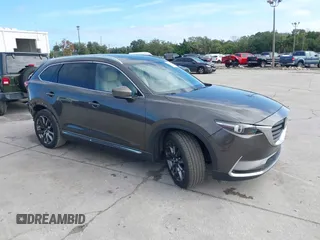 2017 Mazda CX-9 Grand Touring z VIN JM3TCADY7H0133092, wystawiony jako IAAI lot #41133652 z przebiegiem 233 454 mil mil oraz . Historia ofert i sprzedaży dostępna na DreamBid. Obrazek 1.