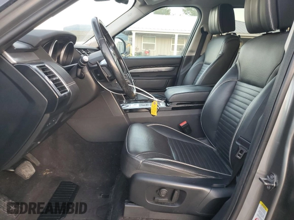 2017 Land Rover Discovery First Edition with VIN SALRTBBV8HA016027, listed as a Copart auction lot 83689894 with 91,000 mi miles and Salvage Title. Bid and sale history available at carsss.com. Image 7.