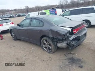 2014 Dodge Charger SXT Plus with VIN 2C3CDXJG0EH230635, listed as a IAAI auction lot 41890555 with 203,869 mi miles. Bid and sale history available at carsss.com. Image 3.