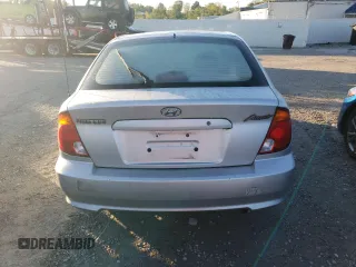 2004 Hyundai Accent GL with VIN KMHCG35C44U284868, listed as a Copart auction lot 74054884 with 87,259 mi miles and Clean Title. Bid and sale history available at carsss.com. Image 6.