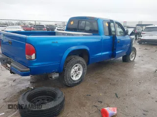 1998 Dodge Dakota SLT z VIN 1B7GG22YXWS683170, wystawiony jako IAAI lot #41903787 z przebiegiem Nie podano mil oraz . Historia ofert i sprzedaży dostępna na DreamBid. Obrazek 4.