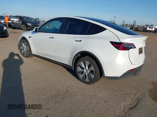 2023 Tesla Model Y Long Range with VIN 7SAYGDEE3PF817097, listed as a IAAI auction lot 41767294 with 64,047 mi miles and . Bid and sale history available at DreamBid. Image 3.