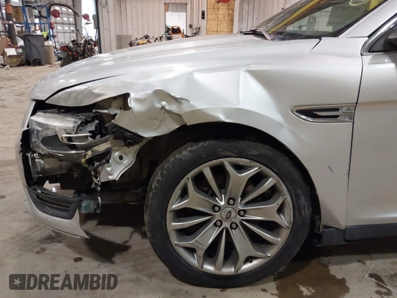 2013 Ford Taurus Limited with VIN 1FAHP2F83DG116657, listed as a IAAI auction lot 41533075 with 124,649 mi miles. Bid and sale history available at carsss.com. Image 18.