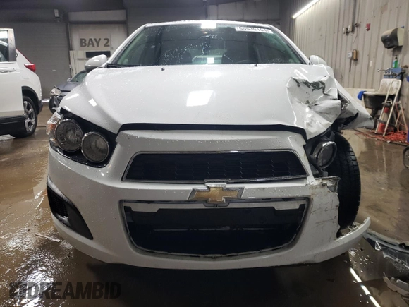 2014 Chevrolet Sonic LT with VIN 1G1JC6SH6E4239708, listed as a Copart auction lot 85530104 with 123,912 mi miles and Salvage Title. Bid and sale history available at carsss.com. Image 5.
