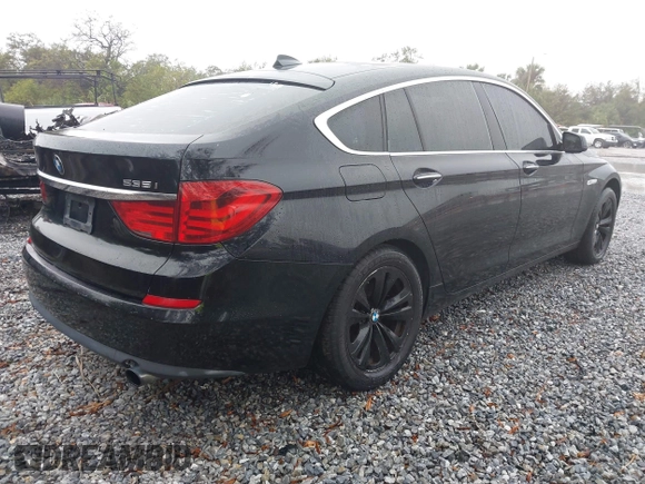 2013 BMW 5 Series GT 535i xDrive with VIN WBASP2C56DC339239, listed as a IAAI auction lot 41412411 with 202,822 mi miles. Bid and sale history available at carsss.com. Image 4.