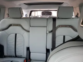 2023 Rivian R1S Launch Edition z VIN 7PDSGABL9PN022280, wystawiony jako Copart lot #83526124 z przebiegiem 51 mil mil oraz Szkoda całkowita • Salvage title. Historia ofert i sprzedaży dostępna na DreamBid. Obrazek 10.
