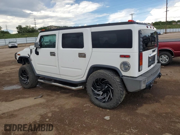 2004 Hummer H2 z VIN 5GRGN23U94H109105, wystawiony jako Copart lot #60548255 z przebiegiem 218 770 mil mil oraz Czysty tytuł • Clean title. Historia ofert i sprzedaży dostępna na DreamBid. Obrazek 2.