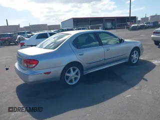 2002 Infiniti I35 Luxury with VIN JNKDA31A72T008698, listed as a IAAI auction lot 41287490 with 136,049 mi miles. Bid and sale history available at carsss.com. Image 4.