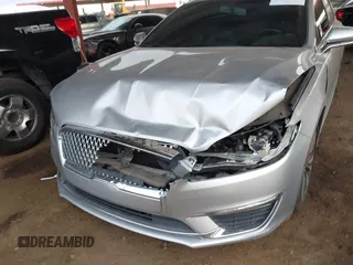 2017 Lincoln MKZ Reserve z VIN 3LN6L5E93HR603246, wystawiony jako IAAI lot #42024614 z przebiegiem 131 622 mil mil oraz . Historia ofert i sprzedaży dostępna na DreamBid. Obrazek 6.