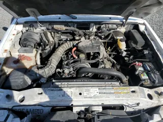 1999 Mazda B-Series 2WD Truck SX with VIN 4F4YR12C4XTM40289, listed as a Copart auction lot 77544354 with 192,046 mi miles and Salvage Title. Bid and sale history available at carsss.com. Image 11.