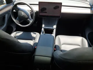2024 Tesla Model Y z VIN 7SAYGDED2RA329802, wystawiony jako Copart lot #57748805 z przebiegiem 19 391 mil mil oraz Szkoda całkowita • Salvage title. Historia ofert i sprzedaży dostępna na DreamBid. Obrazek 8.
