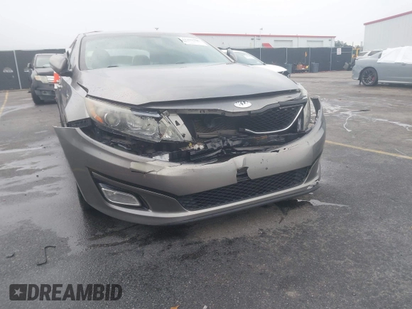 2014 Kia Optima EX z VIN 5XXGN4A75EG290132, wystawiony jako IAAI lot #41292706 z przebiegiem 155 793 mil mil oraz . Historia ofert i sprzedaży dostępna na DreamBid. Obrazek 17.